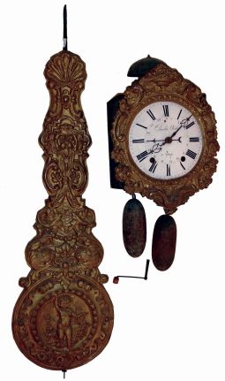 French Morbier 8 days, weight-driven time with "prayer repeat" strike wall clock with calendar. Porcelain dial signed Charles Andre. Anchor escapement, embossed brass pendulum, plus two extra morbier pendulums, c1880