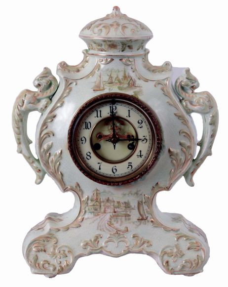 Waterbury Clock Co., Waterbury, Conn., "Parlor No. 44" porcelain shelf clock with a visible escapement spring driven, 8 days, time and hour/half-hour strike movement, c1897.