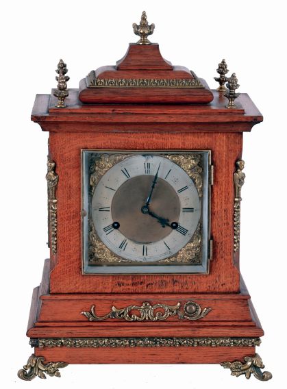 New Haven Clock Co., New Haven, Conn., "Chime Clock No. 3" shelf clock in a light oak case with a spring driven, 8 days, time and strike movement with Westminster chimes on 5 cathedral gongs, c1900.