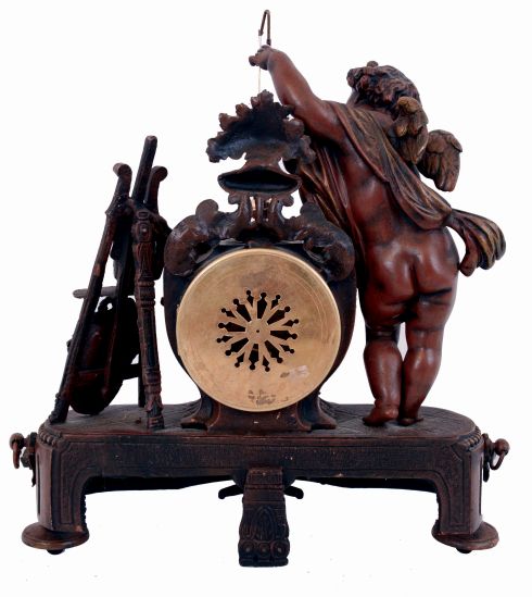 France, conical "mysterious" clock, the patinated spelter case with fluted base and rounded ends, the front festooned with roses and supporting the central clock case, with flanking draped putto, his outstretched arm supporting the gilt conical pendulum, opposite a portrait, easel, and laurel wreath, skeletonized Roman numeral, signed white enamel dial, blued steel Breguet style hands, brass, 8 days, time and strike movement, c1880