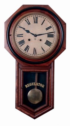 Ansonia Clock Co., New York, NY, "Regulator A" in a black walnut case with an spring driven, 8 days, time and strike movement, c1884.