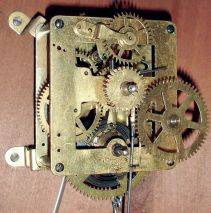 Waterbury Clock Co., Waterbury, Conn., "Calendar No. 34 " oak cased, double dial, 8 days, time only wall clock, c1890