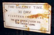 New Haven Clock Co., New Haven, Conn., "14" Gallery", wall clock, 30 days, time only, spring driven movement in a hardwood case with walnut finish with a papered metal dial, c1910.