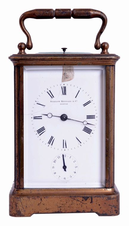 France, for Bigelow, Kennard, & Co., Boston, Mass., hour repeating carriage clock with alarm, gilt Corniche case with bevelled glasses, Roman numeral white enamel dial with with Arabic chapter alarm, blued steel Breguet style hands, 8 days, time, strike and alarm movement with lever platform, repeating the last hour on demand, c1890 and a Waltham 8 days car clock in leather travel case