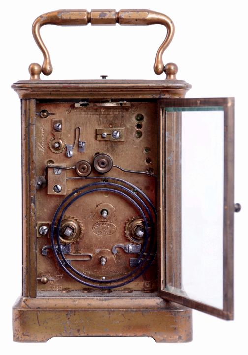 France, for Bigelow, Kennard, & Co., Boston, Mass., hour repeating carriage clock with alarm, gilt Corniche case with bevelled glasses, Roman numeral white enamel dial with with Arabic chapter alarm, blued steel Breguet style hands, 8 days, time, strike and alarm movement with lever platform, repeating the last hour on demand, c1890 and a Waltham 8 days car clock in leather travel case