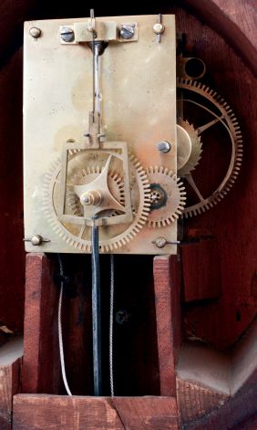 Joshua Wilder, Hingham, Mass., patent timepiece or banjo clock, mahogany case with bullnose molded frames, painted tablets, and four wooden side pieces of unusual form, Roman numeral, white painted iron dial, signed "Warranted by J. Wilder / Hingham", unusual blued steel hands, 8 days, weight driven timepiece movement, weight baffle with watch paper of J. Wilder, c1830