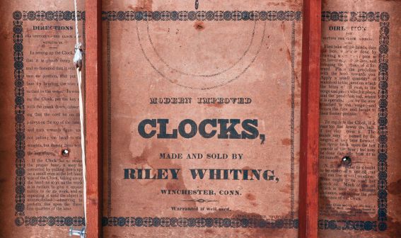 Riley Whiting, Winchester, Conn., carved column and splat shelf clock in a mahogany veneered case with a weight driven, 30 hours, time and strike wood movement, c1830.