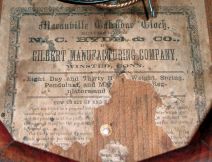 Gilbert Manufacturing Co., Winsted, Conn., "Maranville Calendar Clock " 8 days, time and strike spring driven brass movement drop octagon calendar wall clock, c1865 Label states the clock was made for N. C. Hyde & Co., by Gilbert.