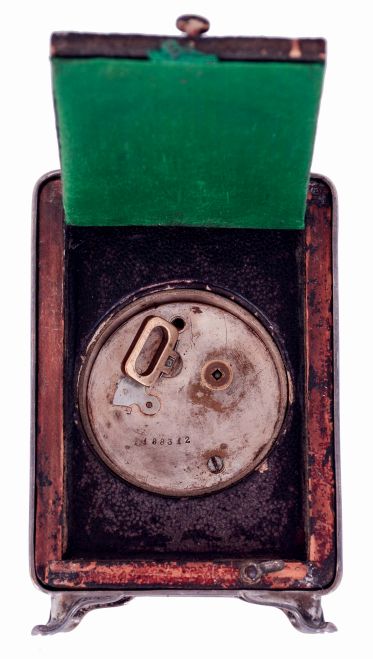 Travel Clock, sterling silver case with purple faux enamel front, case with Birmingham hallmark and date letter for the year 1916, Roman numeral white enamel dial, blued steel hands, 8 days timepiece movement