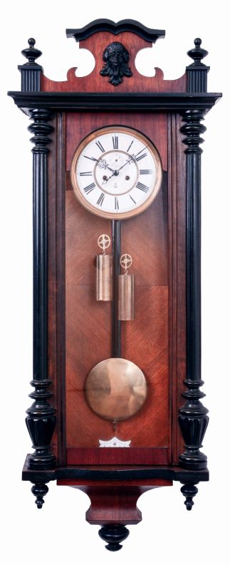 German, Gustav Becker, "Vienna Regulator" 2 weight, gong striking wall clock in a walnut veneer case with black finials and accents, c1890