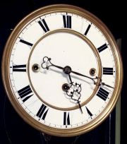 Austrian, 3-weight, Grand Sonnerie, Vienna Regulator, in a dark serpentine case with 2 gilt finials, striking quarter hours on two long steel rods at top of case, c1870, with restorations.