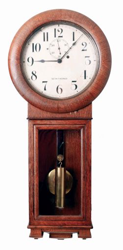 Seth Thomas Clock Co., Thomaston, Conn., "Regulator No. 2" wall clock in oak case with 8 days, weight driven timepiece movement, c1910.