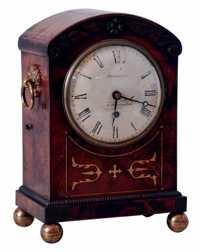Hordern, Leamington, England, bracket clock in the Regency style, oak case with figured mahogany veneer, brass inlay and applied carved ornament, brass ball feet and carrying handles, brass bezel with convex glass, Roman numeral white painted sheet iron dial, 8 days, fusee timepiece movement, c1835