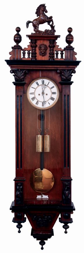 German, 2-weight, gong strike, "Vienna Regulator" in a walnut veneer case and with original top surmounted by a horse, c1875