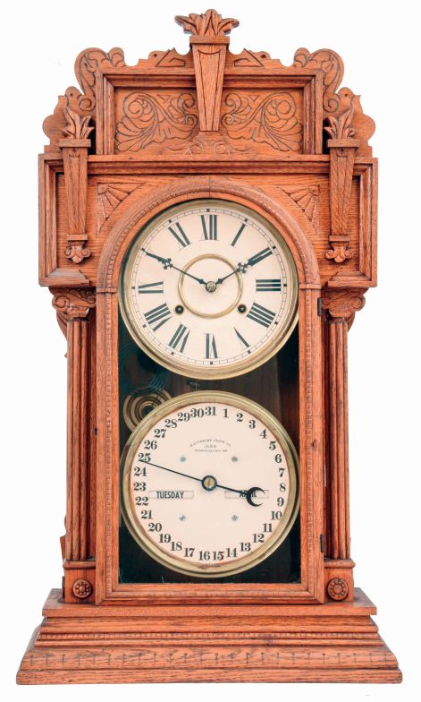 Waterbury Clock Co., Waterbury, Conn., "Calendar No. 43", 8 days, time and strike, spring driven brass movement double dial calendar clock, c1912