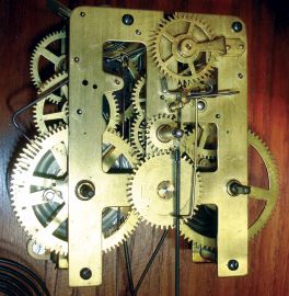 Waterbury Clock Co., Waterbury, Conn., "Calendar No. 43", 8 days, time and strike, spring driven brass movement double dial calendar clock, c1912