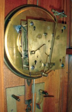 Junghans, Germany, walnut, time and strike, weight driven Vienna regulator wall clock, engraved pendulum and weights, c1920
