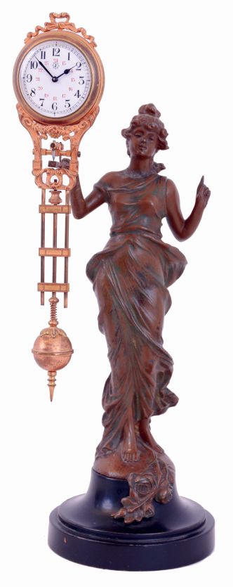 Junghans "Diana" swinger, patinated spelter figure standing on a turned, ebonized base and holding the clock with her right hand, gilt clock/ pendulum with Arabic numeral Canadian white enamel dial, 8 days timepiece movement, c1930