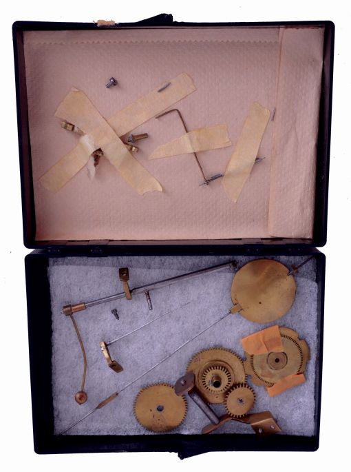 European bracket clock, mahogany and mahogany veneer oak case in the Regency style, gilt brass bracket feet, brass stringing and molding, engine turned gilt bezel with Roman numeral silvered dial, the matted, gilt center with silvered plaque signed "Jan Van Dijk Amsterdam", and also with painted moon phase disc, 15 day rectangular brass, time and strike movement with verge escapement, five turned baluster pillars, pierced steel warning and locking levers, movement early 18th century, case early 19th century