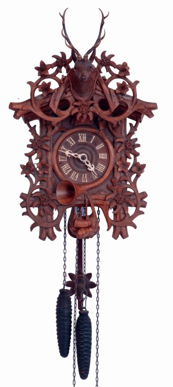 German, Black Forest cuckoo, smaller size but with highly detailed carving of edelweiss flowers, surmounted by a finely detailed stags head, c1920