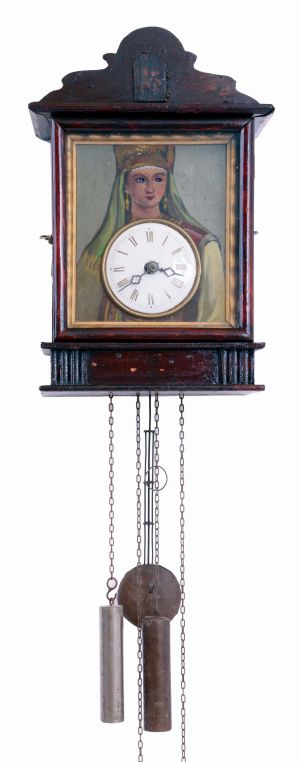 Eastern European or German, architectural cuckoo, a painting of a gypsy with the clock in her belly, and her eyes moving from side to side as the clock runs, c1900
