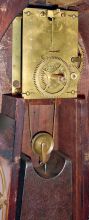 Attleboro, Mass., style banjo wall clock, 8 days, time only, weight driven movement with a maple or light mahogany case with a painted metal dial and reverse painted throat and lower tablets, c1860