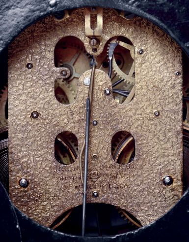 Ansonia Clock Co., New York, NY, "Rosalind" enameled iron case mantel clock with a spring driven, 8 days, time and hour/half-hour strike movement with a visible escapement, c1904.