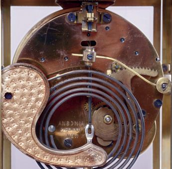 Ansonia Clock Co., New York, NY, "Crown" Crystal Regulator mantel clock with a spring driven, 8 days, time and hour/half-hour strike (rack and snail) movement and a visible escapement, c1914.