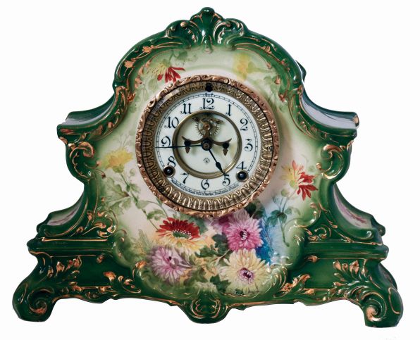 Ansonia Clock Co., New York, NY, "La Nord" porcelain shelf clock in a Royal Bonn case with a spring driven, 8 days, time and hour/half-hour strike movement with visible escapement, c1904.