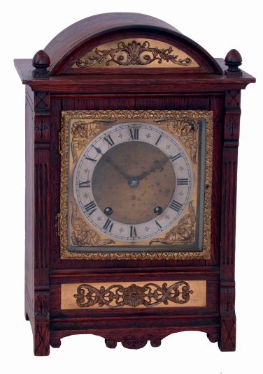 German oak unsigned, 8 days, two-train striking bracket clock in arch topped wood case with decorative brass panels, c1900