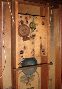 E. & G. W. Bartholomew, Bristol, Conn., shelf clock, mahogany case with unusual striped stenciled columns and a weight driven, 30 hours, time and strike wooden movement, c1832.