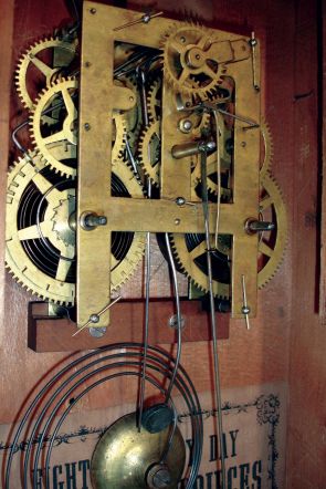 Atkins Clock Co., Bristol, Conn. Cottage mantel clock in a rosewood veneered case with a spring driven, 8 days, time and strike movement, c1870.