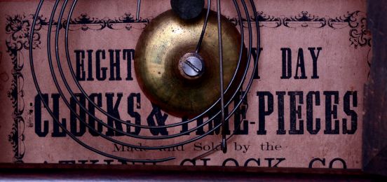 Atkins Clock Co., Bristol, Conn. Cottage mantel clock in a rosewood veneered case with a spring driven, 8 days, time and strike movement, c1870.
