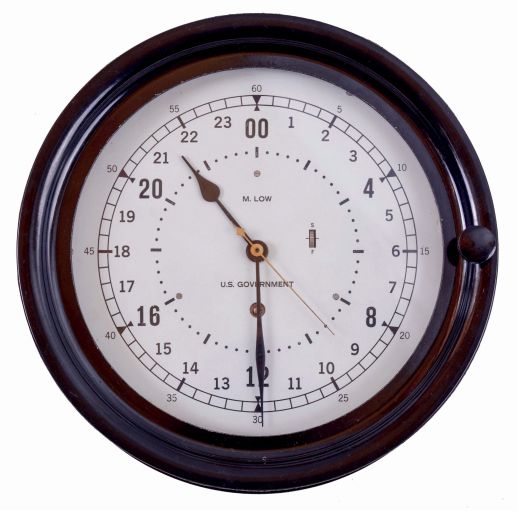 Chelsea Clock Co., Boston, Mass., 8 days, brass spring lever movement deck or engine room timepiece. Dial is marked: "M. Low, New York" on the case back and the movement that looks to be nickel plated. serial #931969