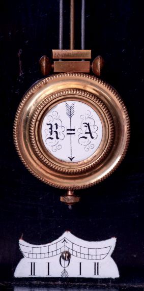 Gustav Becker, Germany, desk or table clock, the cast brass front ornamented in the Adamesque style, also with half caryatids, and arched top with satyr mask, the back of the top marked "Sim. K. Noch 13888", all mounted to an ebonized wooden case, with Roman numeral white enamel dial, black steel hands, 8 days timepiece movement, the back plate with Becker logo, R/A pendulum suspended from the top of the movement mounting bracket, c1890