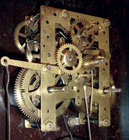 Southern Calendar Clock Co., Saint Louis, MO, "Fashion No. 9" calendar shelf clock in a walnut case with a spring driven, 8 days, time and strike movement (New Haven Clock Co.), c1885.