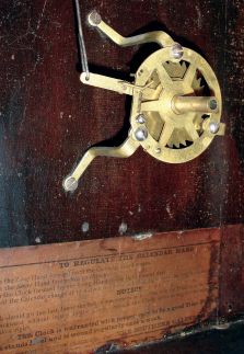 Southern Calendar Clock Co., Saint Louis, MO, "Fashion No. 9" calendar shelf clock in a walnut case with a spring driven, 8 days, time and strike movement (New Haven Clock Co.), c1885.