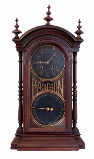 Southern Calendar Clock Co., Saint Louis, MO, "Fashion No. 9" calendar shelf clock in a walnut case with a spring driven, 8 days, time and strike movement (New Haven Clock Co.), c1885.