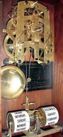 Southern Calendar Clock Co., Saint Louis, MO, "Fashion No. 4" calendar shelf clock in a walnut case with a spring driven, 8 day, time and strike movement (Seth Thomas) and a R. T. Andrews 1876 patent calendar mechanism (Seth Thomas), c1885.