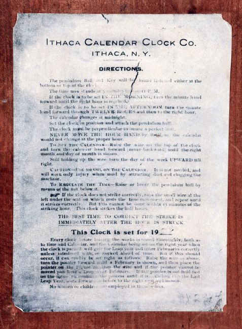 Ithaca Calendar Clock Company, Ithaca, NY., "No. 7 Shelf Cottage" mantel clock in a walnut case with a spring driven, 8 days, time, strike and alarm movement (by Noah Pomeroy. Bristol, Conn.) with Horton