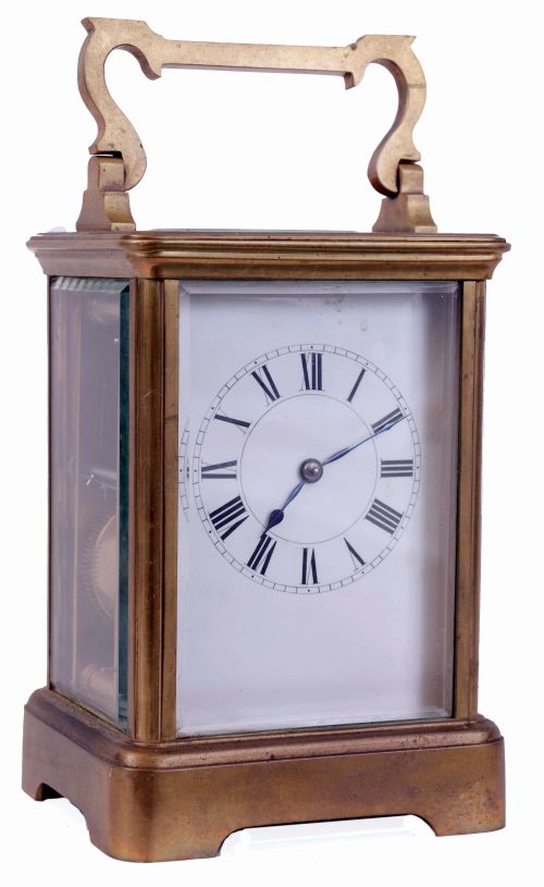 France, carriage clock with travel case, gilt brass Corniche variant case with beveled glasses, Roman numeral white enamel dial, blued steel hands, 8 days, time and strike movement with lever platform, leather covered wooden case with sliding panel and key, c1900