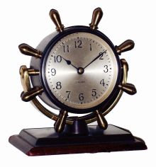 Chelsea Clock Co., Boston, Mass., "Comet", bronze on mahogany base, 8 days, time only swivel head yacht wheel desk clock, c1948