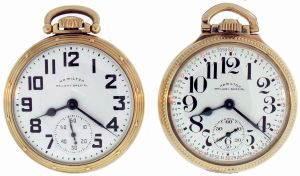 Pocket watches- 2 (Two): Both 21 jewel Hamilton 992B, both in Hamilton gold filled screw back and bezel cases, one with Arabic numeral melamine dial, the other with Montgomery Arabic numeral white painted metal dial, serial #C493770, C413927
