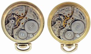 Pocket watches- 2 (Two): Both 21 jewel Hamilton 992B, both in Hamilton gold filled screw back and bezel cases, one with Arabic numeral melamine dial, the other with Montgomery Arabic numeral white painted metal dial, serial #C493770, C413927