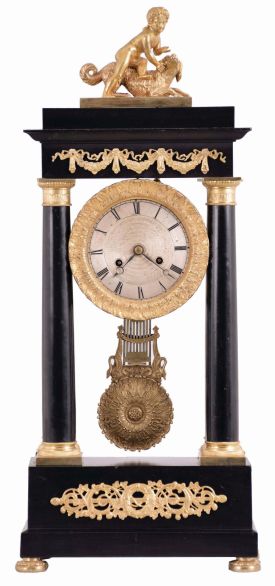 Delcamp, a Paris, portico clock, the ebonized case with classical, gilt mounts, the top with a figure of a boy and his dog, acanthus ornamented bezel with Roman numeral, engine turned silvered dial, blued steel Breguet style hands, 8 day, time and strike pendule de Paris movement, fancy gridiron pendulum with swans and foliate decoration