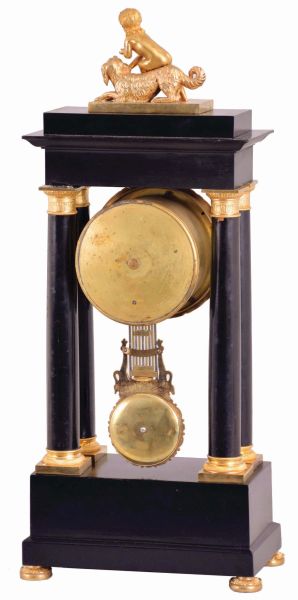 Delcamp, a Paris, portico clock, the ebonized case with classical, gilt mounts, the top with a figure of a boy and his dog, acanthus ornamented bezel with Roman numeral, engine turned silvered dial, blued steel Breguet style hands, 8 day, time and strike pendule de Paris movement, fancy gridiron pendulum with swans and foliate decoration