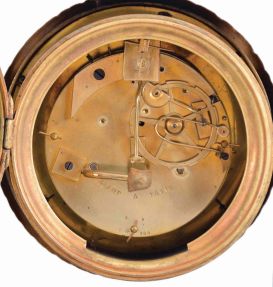 Delcamp, a Paris, portico clock, the ebonized case with classical, gilt mounts, the top with a figure of a boy and his dog, acanthus ornamented bezel with Roman numeral, engine turned silvered dial, blued steel Breguet style hands, 8 day, time and strike pendule de Paris movement, fancy gridiron pendulum with swans and foliate decoration