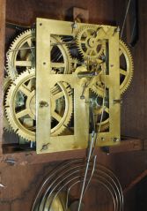 Chauncey Jerome, New Haven, Conn., Empire case shelf clock with a weight driven 30 hour time and strike movement in a mahogany veneered case.