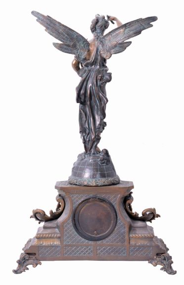 Ansonia Clock Co., New York, "Undine" 8 day, time and strike, spring driven brass movement mantel clock with a figure of "Gloria" on top.