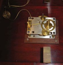 Clocks- 4 (Four): (1) E. Ingraham Co., Bristol, Conn., "Western Union" hanging clock with a spring driven, 8 day timepiece movement in a solid oak case, c1905; (2) E. Ingraham Co., Bristol, Conn., "Reliance" hanging clock with a spring driven, 8 day timepiece movement in a solid oak case, c1911; (3) Seth Thomas Clock Co., Thomaston, Conn., "World" hanging clock with a spring driven double wind 30 day timepiece movement in an oak case, c1921; (4) Bench made wall clock with E. Howard & Co., NO. 5, 8 day, weight driven, time only nickel plated movement and Howard damascened pendulum bob with painted metal dial.